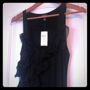 Black tank with asymmetrical ruffle detail